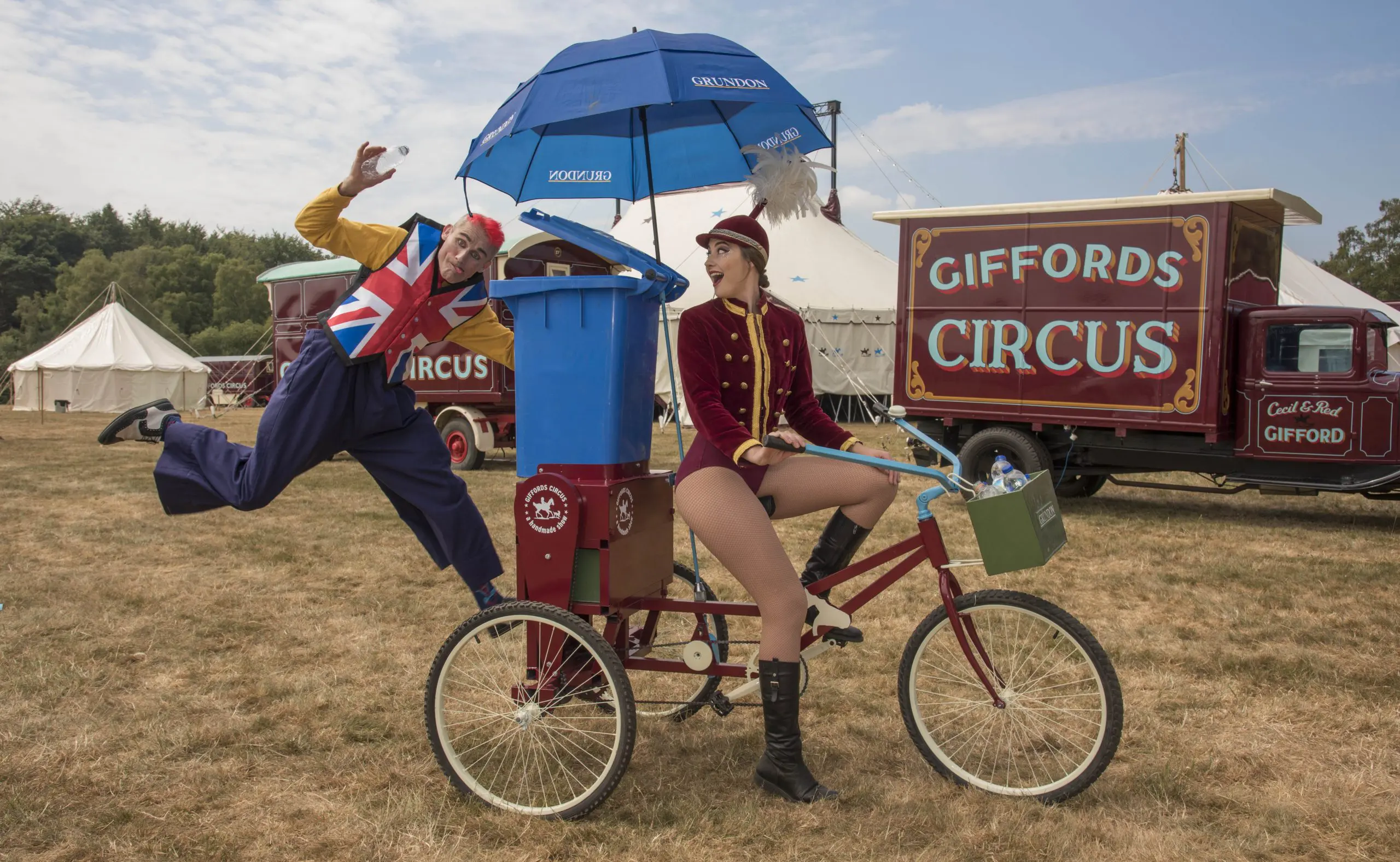 Tweedy and showgirl Lizzie clowning around on the Recycle Bicycle