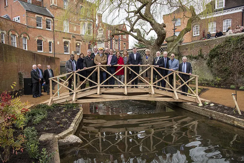 Project supporters gathered for the official opening, including Norman Grundon (wearing a cap), Ros Rivaz (red coat) and Peter Eaton (second from right) with Lord Waldegrave (far right).