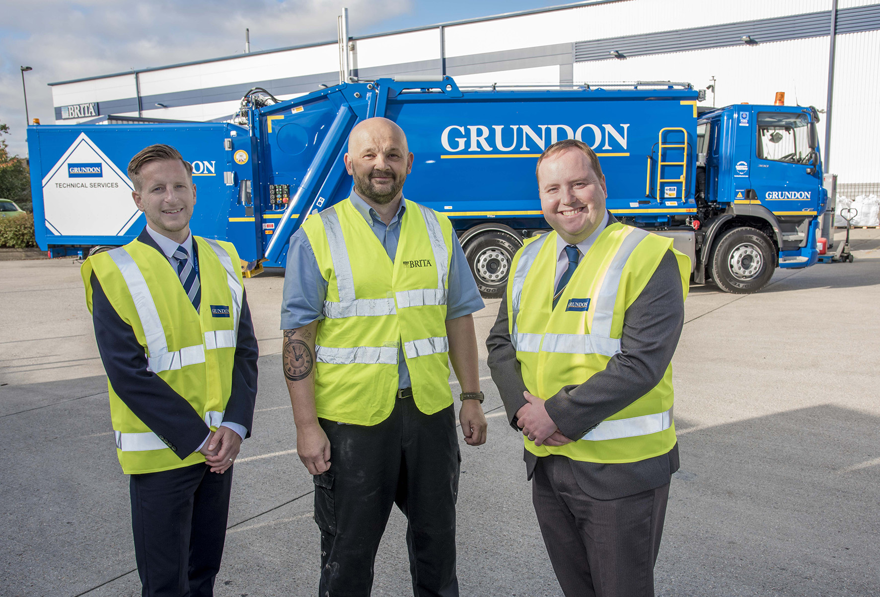 Celebrating a recycling success story: (from left to right) James Standen, Senior Sales Representative, Grundon; Bryan Edwards, Professional & Services Warehouse Manager at BRITA; and Ollie Stoddart, Senior Technical Waste Sales Representative at Grundon