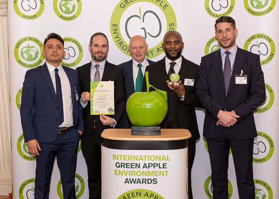 Jack Yarrow, Regional Sales Manager at Grundon Waste Management (right) joined (from the left) Southside Shopping Centre's Nelson Llano Buenano, Pieter Strömbeck and Lenford Jackson, as they collected their Bronze Green Apple Award for Environmental Best Practice in the Retail Waste Management National category from Roger Wolens, Founder of The Green Apple Awards and Chief Executive Officer of The Green Organisation (centre)