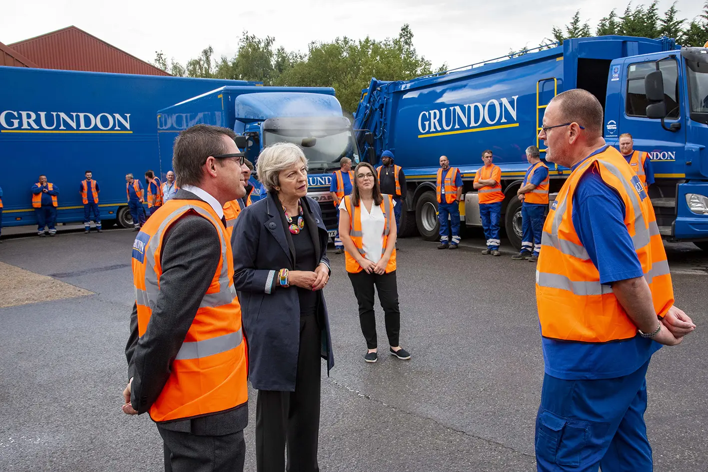 During her visit, Theresa May MP met some of the specialist clinical waste drivers and treatment facility operators, plus other members of the Knowl Hill team, including Mark Padgham (left) and Graham Dunstan (right)