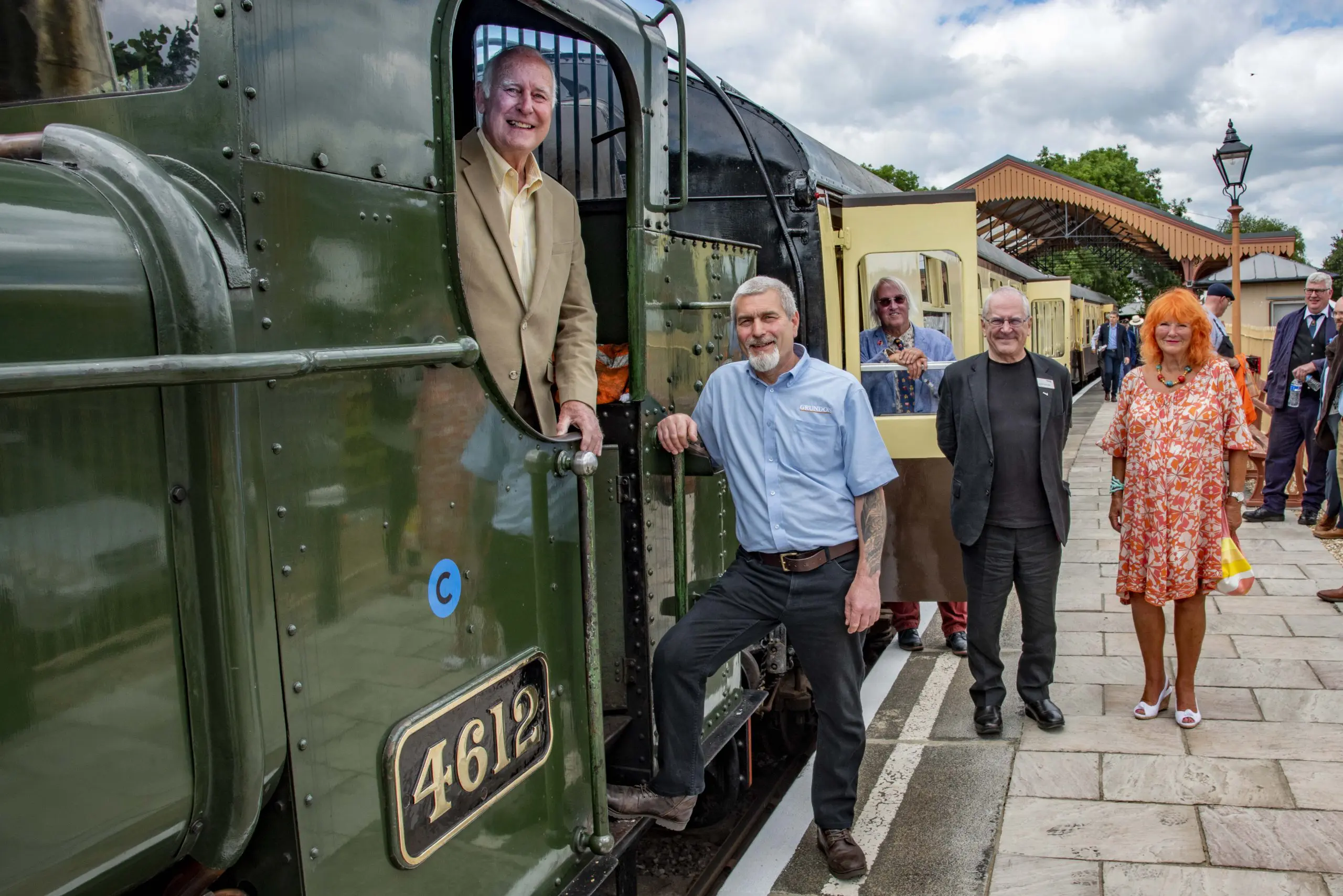 Full steam ahead: (from left) Norman Grundon, Peter Kent, Tony Stead (in background), Sir Peter Hendy CBE and Lady McAlpine.