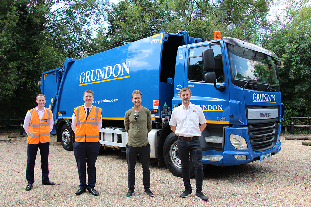 From litter picking to recycling: (From left to right) Grundon’s Owen George, Group Development and Innovation Manager; and Anthony Foxlee-Brown, Head of Marketing and Communications, welcomed four-time Formula 1 World Champion Sebastian Vettel and Stephane Bazire, Head of Business Sustainability at Silverstone Circuits Limited to a tour of Grundon’s waste treatment facilities in Colnbrook. Sebastian also got a first-hand look at Grundon’s ultra-low emission hydrogen/diesel dual-fuel waste collection vehicle