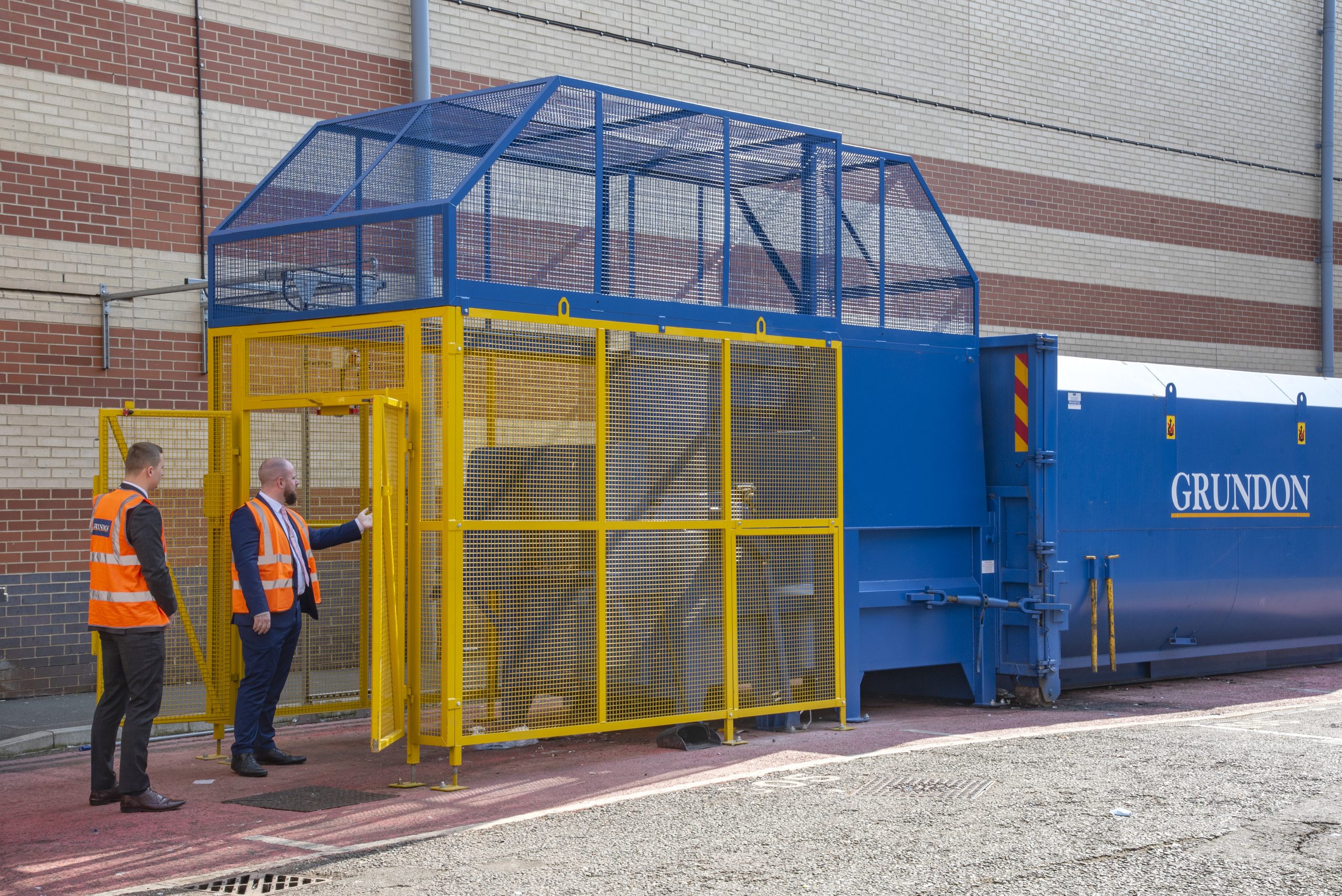 Grundon's engineers made a bespoke cage around a compactor, making it safe in an area which is accessible to the public.