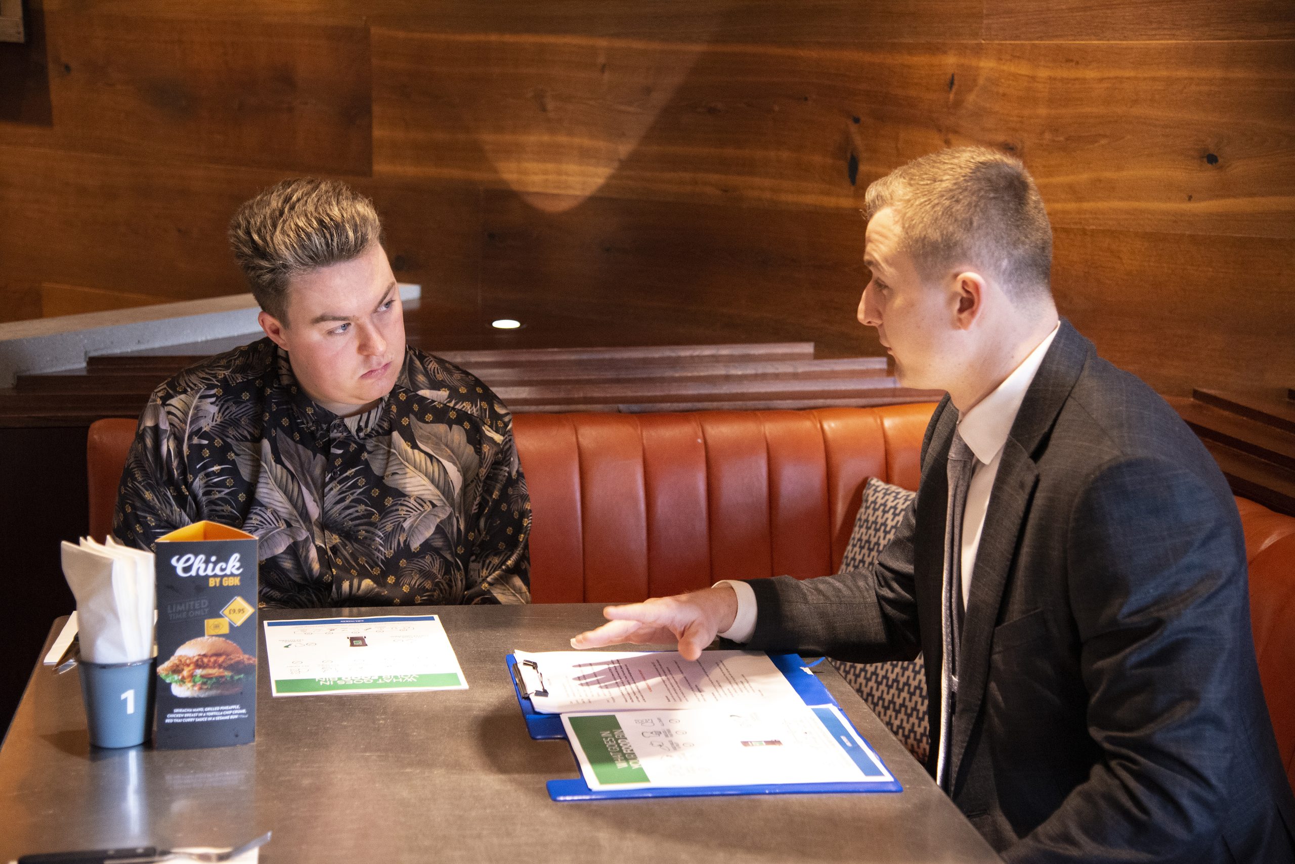 Grundon contract manager James Luckett explains food waste proposals to Edward Walker, Restaurant Manager at Gourmet Burger Kitchen, Lakeside