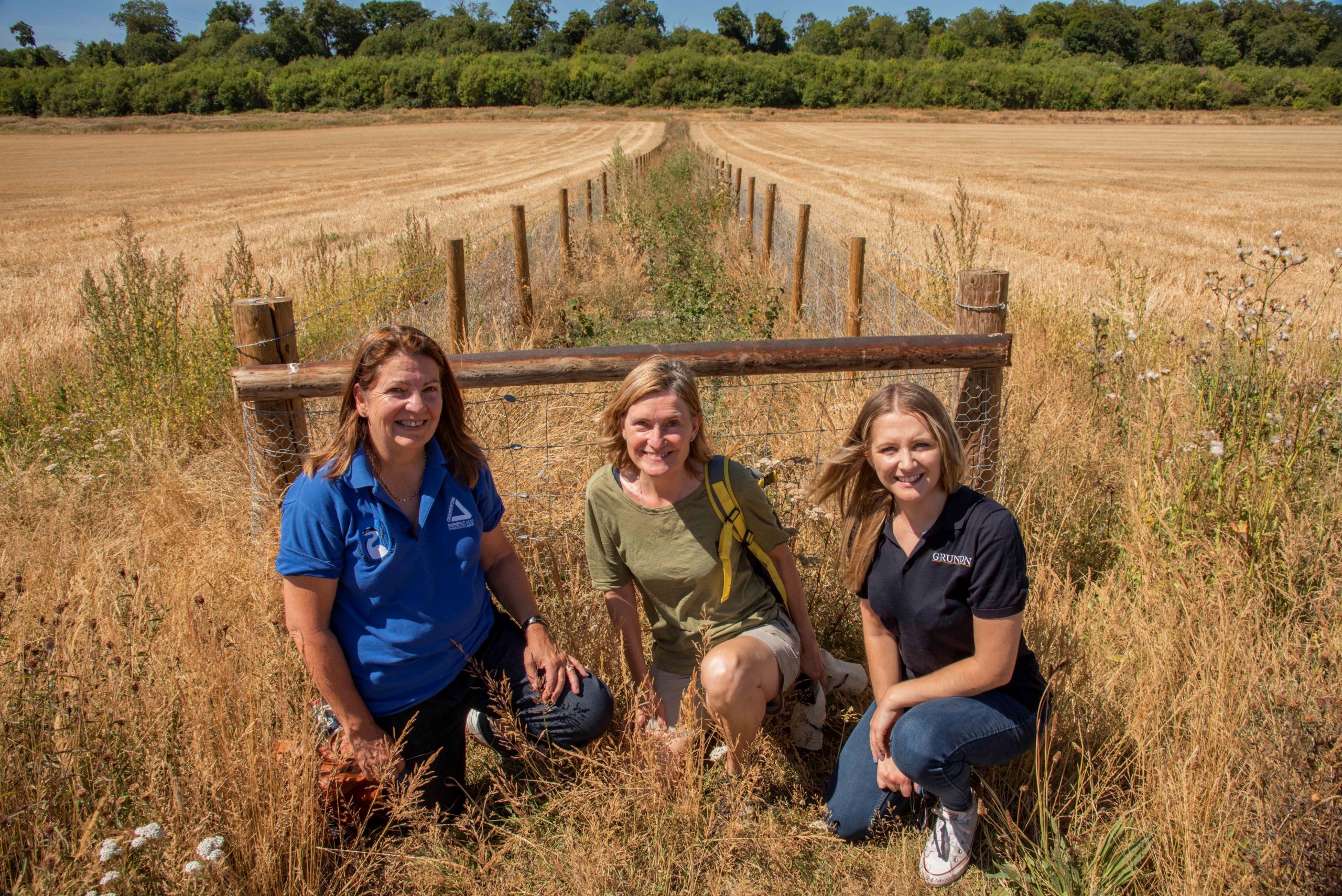 Pictured at Woodoaks Farm in front of the new fencing around the young hedges are: (l-r) Groundwork South’s Debbie Valman, Rose Lewis, the Soil Association’s Programme Manager for Woodoaks, and Grundon’s Kirsti Santer.