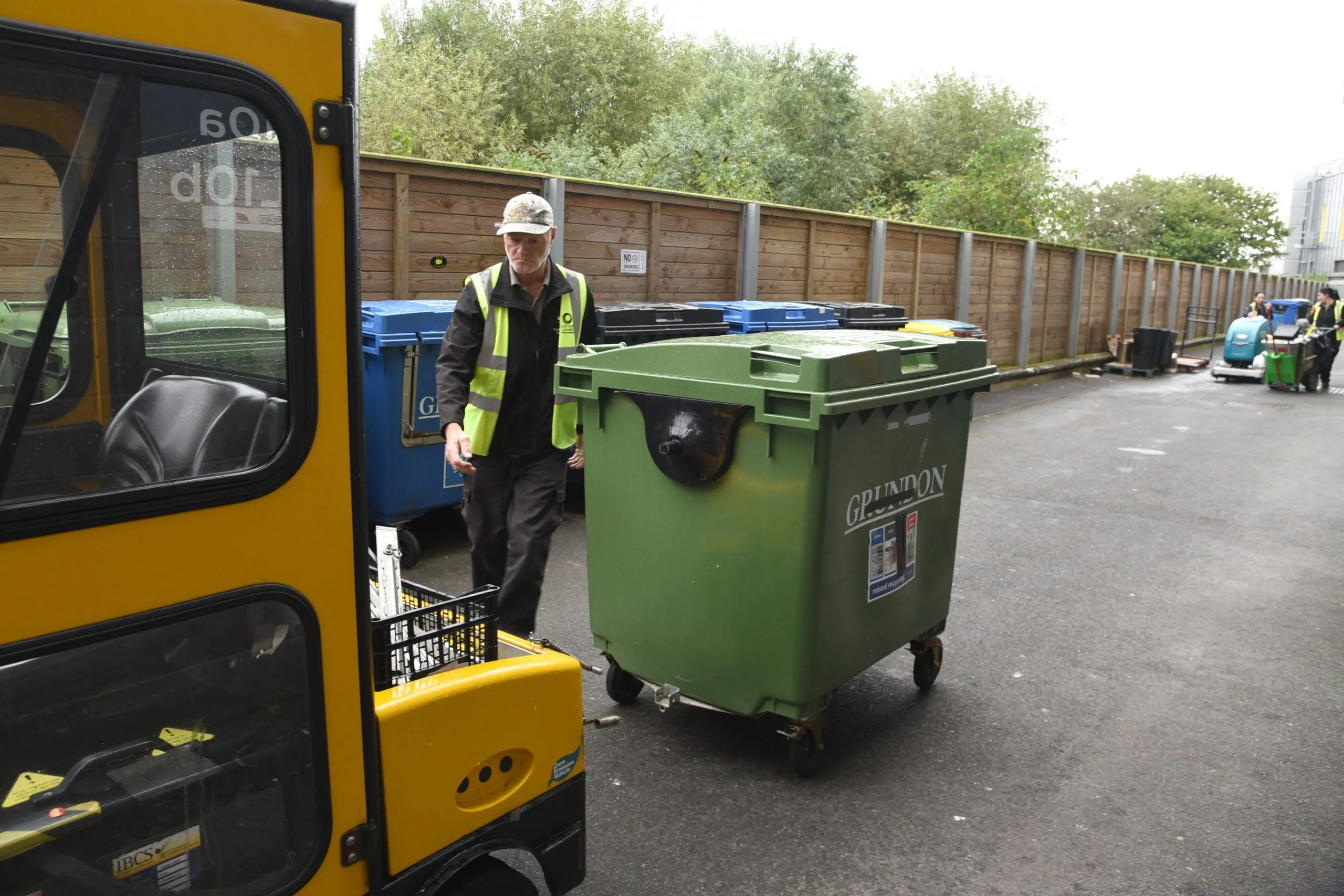 An electric tug is used to take full containers from ‘bin alley’ to the service yard