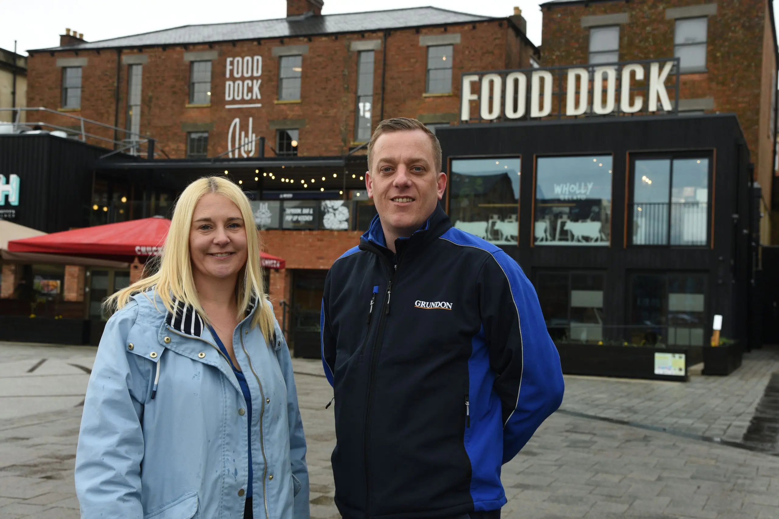 Kyla Hyett, General Manager at Gloucester Food Dock is pictured with Grundon's Nick Malvern