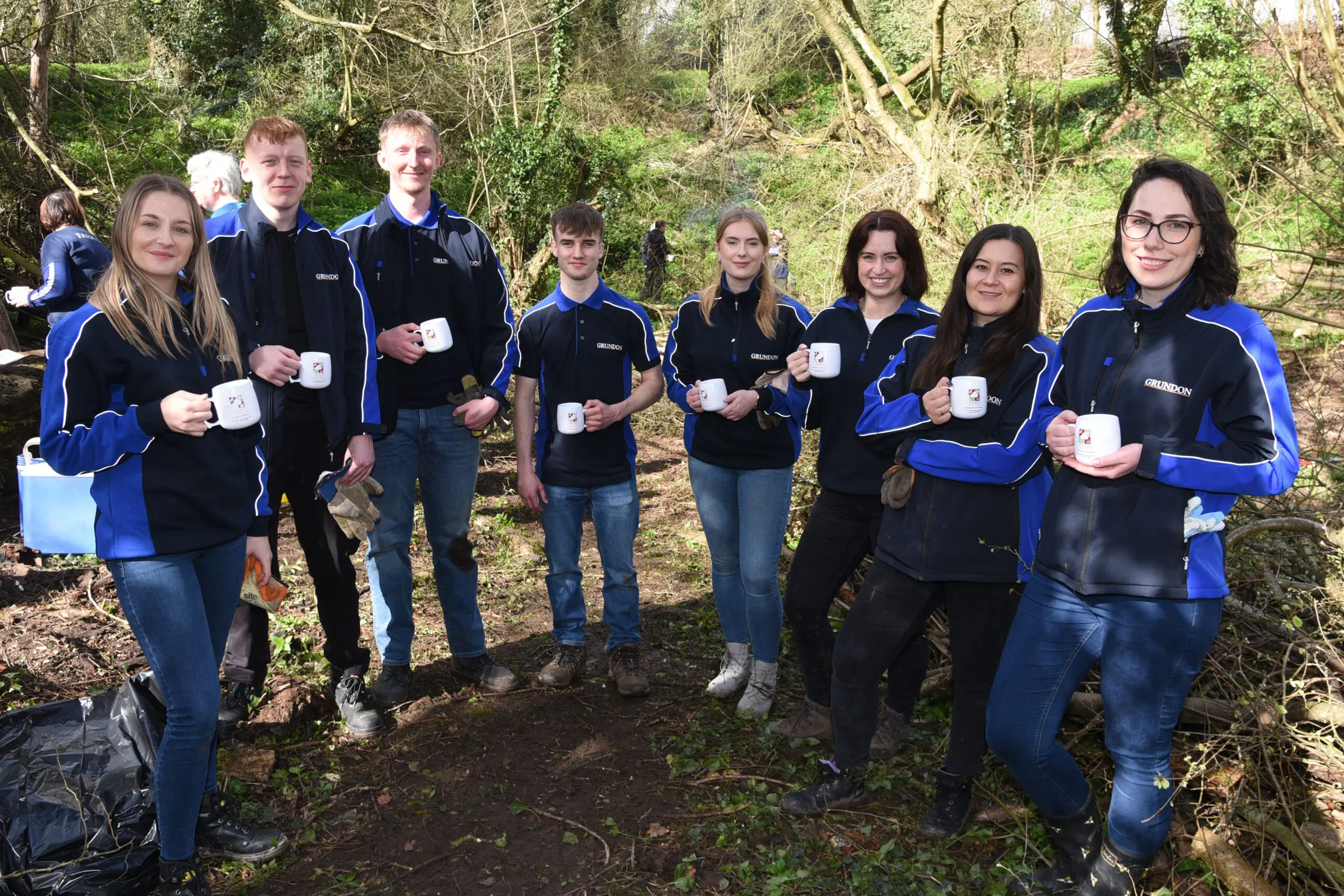 Taking a well-earned break - the team of Grundon volunteers