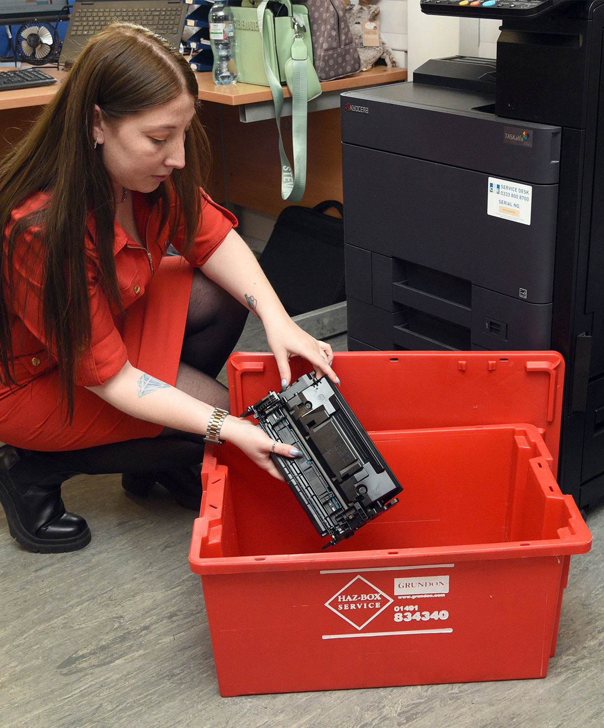 Hazardous waste being placed in Haz-Box