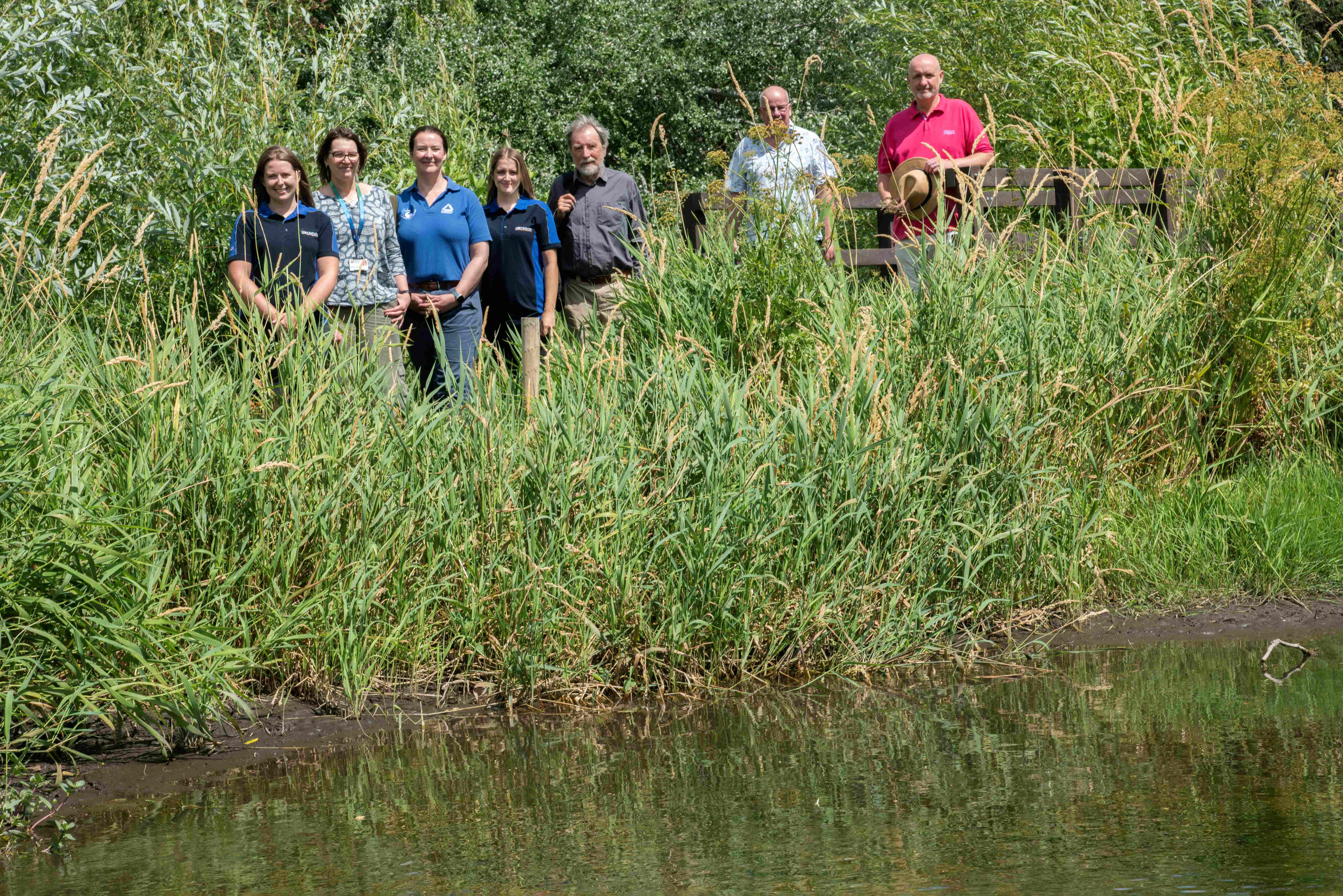 After: Wildlife pond has been expanded along with a new bridge to improve access